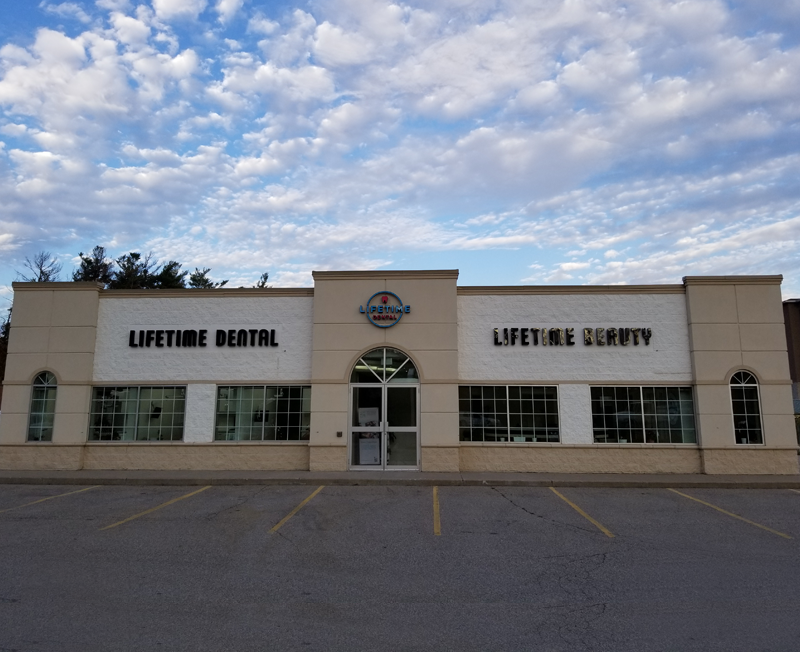The front of the Lifetime Dental building seen from the parking lot.